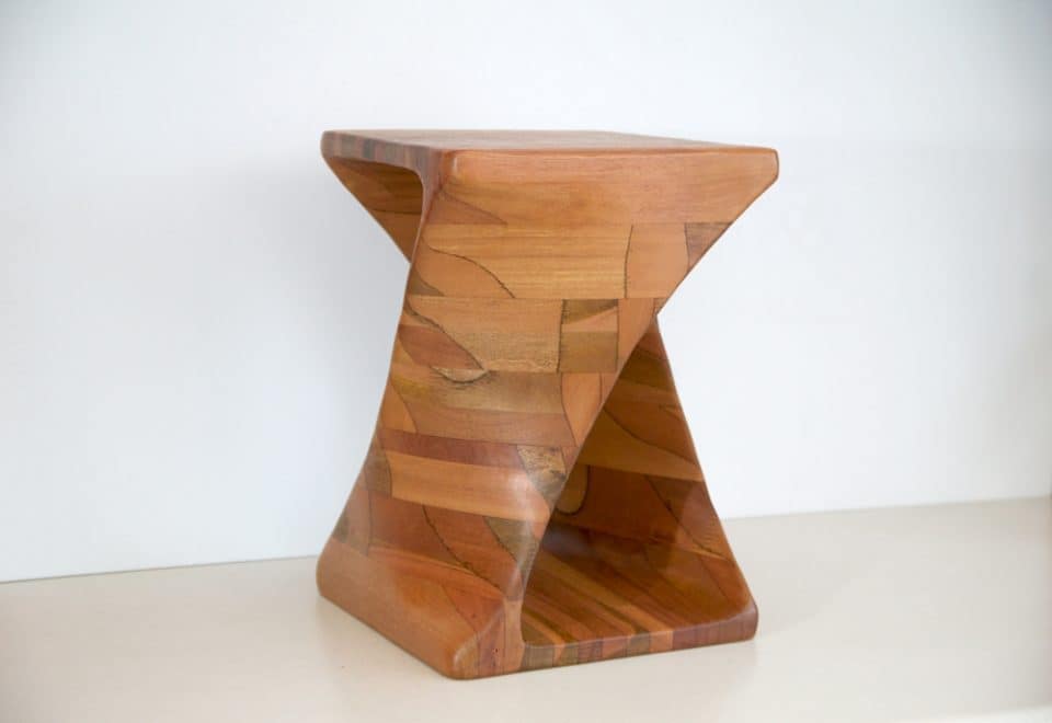 Power carved wooden twist table